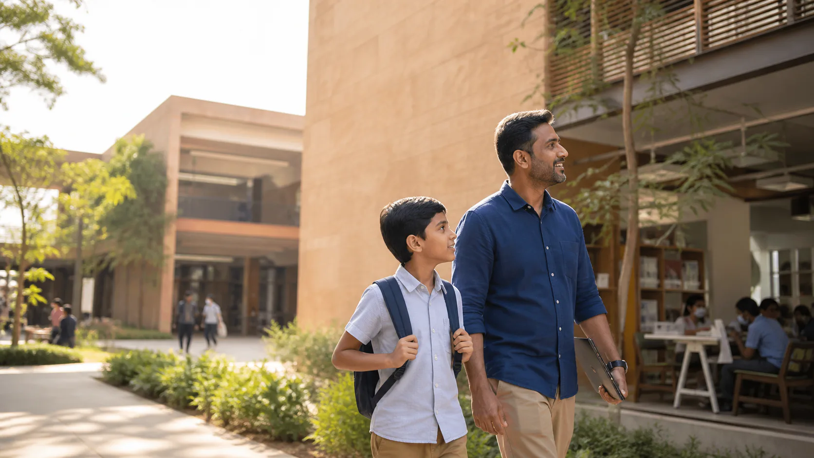 Indian parent and child visiting a contemporary school campus